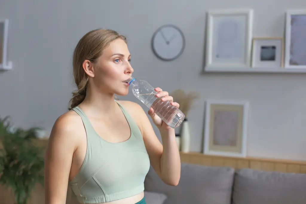young-beautiful-woman-drinking-water-after-exercising-attractive-female-bodybuilder-working-out-fitness-and-healthy-lifestyle-concept.jpg